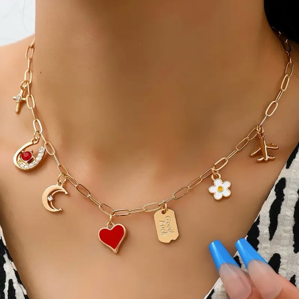 Charming Gold and Red Necklace with Heart and Star Charms - Picture 2 of 3